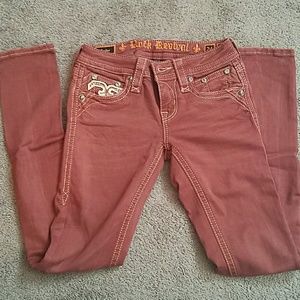 Rust color Rock Revival Skinny Jeans